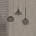 Modern Transparent Glass Pendant Lights With Spherical And Bell Shapes Hanging In Interior Space