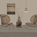 Natural Wicker Leisure Chairs In Indoor Space With Pendant Lamp And Decorative Vase