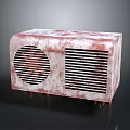 Rusted Electronic Appliance With Circular Fan Grille Striped Heat Dissipation Grille Rectangular Design Bottom Supports