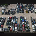 Numerous Various Colored Cars Parked In Outdoor Parking Lot With Different Models