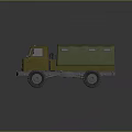 Military Tank Like Vehicle With Green Cover