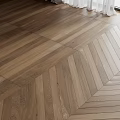 Elegant Wooden Flooring In Herringbone Pattern With Natural Wood Grain And Warm Tones