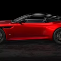 Red Sports Car With Sleek Design Black Alloy Wheels And Aerodynamic Body