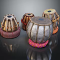 Exquisite Traditional Decorative Musical Instruments With Painted Tabla Drums On Reflective Black Surface