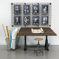 Wooden Work Table With Metal Stool And Rolled Papers Near Grid Wall Blueprints