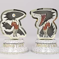 Stylish Cartoon Monster Trophies Featuring Red Shirts Silver Bases And MONSTER Details