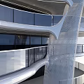 Modern High Rise Residential Building With Curved Design Glass Curtain Walls And Greenery