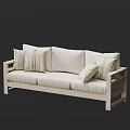 Light Colored Three Seater Sofa With Wooden Armrests And Striped Cushions