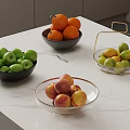 Assorted Fresh Fruits in Black and Glass Bowls with Baskets on Marble Countertop