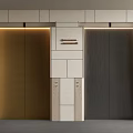 Modern Elevators With Gold And Dark Doors In Light Colored Stone Wall Design