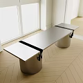 Modern Home Office Desk With Smooth Stainless Steel Surface And Cylindrical Black Base Design