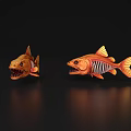 Two Orange Fish 3D Models With Sharp Teeth And Skeletal Structure On Black Reflective Background 3d model