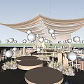 Elegant Banquet Hall With White Drapes Chandeliers Stage Moon Silhouette And Floral Decor