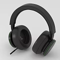 Black Over Ear Wired Headphones With Green Accents For Audio Enjoyment