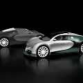 Two Bugatti Sports Cars In Dark And Silver Green Colors On Black Glossy Reflective Surface
