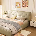 Light Green Upholstered Double Bed With Gray Pink Bedding Striped Rug And Decorative Paintings