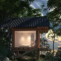 Wooden Guesthouse Building In Mountain Forest With Black Tiled Roof And Sunset View