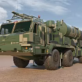 Camouflage Green Military Vehicle With Missile Launch System And Multiple Wheels On Desert Terrain
