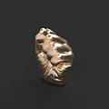 Golden Detailed Clenched Hand Sculpture With Artistic Design Against Dark Background
