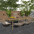 Outdoor Wooden Table With Rattan Chairs Set And Green Plants On Tiled Floor