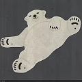 Polar Bear Shaped White Rug With Black Paw Details On Dark Wooden Floor