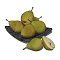 Fresh Yellow Green Pears Including Whole And Sliced On Black Plate