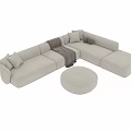 Modern Two Seater Sofa With Beige Brown Tones Pillows Ottoman And Throw Blanket