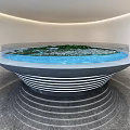Commercial Display Equipment With Modern Circular Design Water Pool Green Plants And Steps