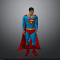 Male Superhero in Blue Costume with Red S Symbol Red Cape and Boots Standing on Gray Background