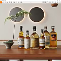 Whiskey Bottles and Wine Glasses on Wooden Table with Decorative Circular Lights and Palm Plant