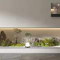 Minimalist Indoor Landscape Design With Built in Planter Stones Green Plants And Round Lights