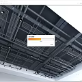Modern Industrial Suspended Ceiling With Metal Framework Grid Panels And Recessed Lighting