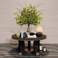 Ornamental Decor Set With Round Table Vase Green Foliage Table Lamp And Books