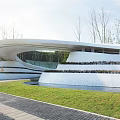 Modern Garden Landscape With Curved Architecture Terraced Greenery And Water Features