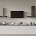 Modern Kitchen Appliances Display With Multiple Range Hoods And Cooktops And Pots On Shelf
