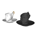 Unique Head Shaped Cups With White Black Design And Golden Handle Matching Saucers