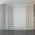 Modern White Glass Block Grid Wall Design In Bright Interior Living Space