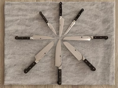 Set of Kitchen Knives Arranged in Star Shape on Gray Towel with Sharp Blades 3d model Set of Kitchen Knives Arranged in Star Shape on Gray Towel with Sharp Blades 3d model