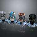 Four Colorful Robot Character Models With Diverse Designs On Circular Bases