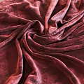 Burgundy Velvet Fabric With Soft Textured Surface And Elegant Folds