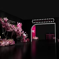 Stylish Photo Spot with Pink Flowers Lighted Archway ME Lettering on Wall and Decorative Lights