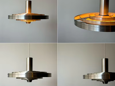Modern Metallic Pendant Light With Layered Circular Structure And Warm Yellow Glow 3d model