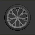 Black Rubber Tire With Silver Alloy Wheel And Reflective Rim Design