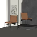 Modern Tan Leather Dining Chairs With Sleek Metal Frame In Minimalist Interior Space