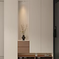Elegant Modern Shoe Cabinet With Minimalist Design And Decorative Vase In Neutral Tones