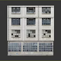 Multi Story White Building With Multiple Windows And Ground Floor Large Glass Panels