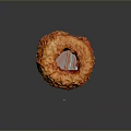 Freshly Baked Orange Donut With Textured Crust And Glossy Finish On Dark Background