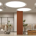 Clothing Store Interior With Circular Ceiling Lights Brown Pillar Racks Mannequins Plants And Wooden Cabinets
