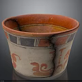 Traditional Ancient Pottery Sculpture With Red Orange Decorations And Intricate Colorful Patterns