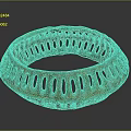 Ancient Bronze Circular Sculpture Carving With Hollowed Out Patterns And Green Patina